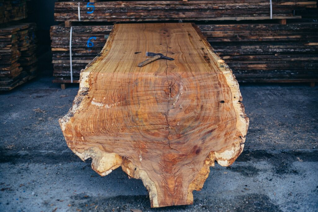 Custom handmade dining table in Dubai, crafted as a unique one-piece centerpiece, price range 18,000–650,000 AED, luxury bespoke design for your space